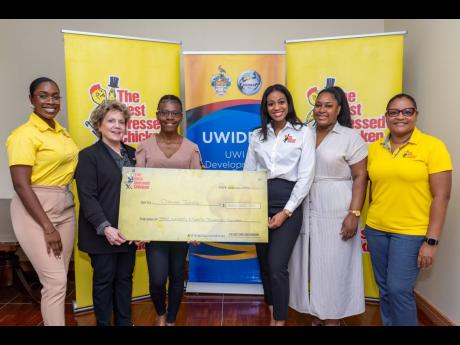A bright future awaits St Catherine High School alumna and 2024 top CAPE student Danae Jones (third left), who overcame significant challenges, including limited resources during the pandemic, to achieve academic excellence. Awarded The Best Dressed Chicke