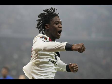 Credit: AP Manchester United’s Kobbie Mainoo celebrates after scoring against Romanian champions FCSB during their Europa League match in Bucharest yesterday.