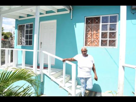 Sandra, the mother of Kimesha Francis, one of the first NSHP recipients in 2018, says they have maintained their home in Shooter’s Hill, Bull Bay, repainting it and growing a lush garden at the front.