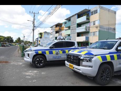 The police in Ellerslie Pen in Spanish Town.