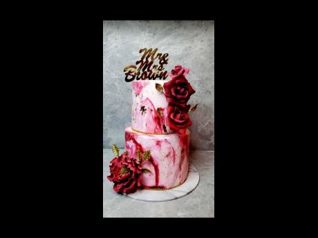 This stunning wedding cake was made with love just for Mr and Mrs Brown by Sugar Junkie Ja.