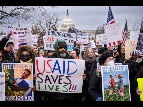 Demonstrators and lawmakers rally against President Donald Trump and his ally Elon Musk as they disrupt the federal government, including dismantling the US Agency for International Development, which administers foreign aid approved by Congress, on Capito