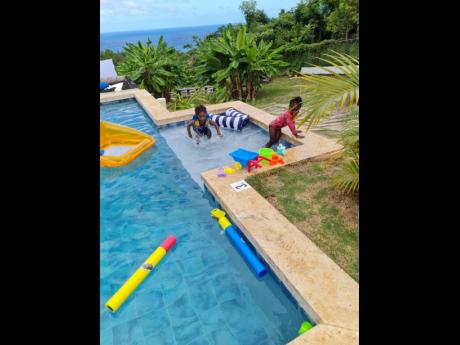 The young ones enjoying the pool at Catch My Drift Villa in Boscobel, St Mary.