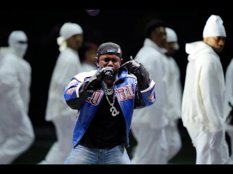 Kendrick Lamar wore a custom Martine Rose leather jacket, statement Tiffany & Co jewellery and Celine jeans.
