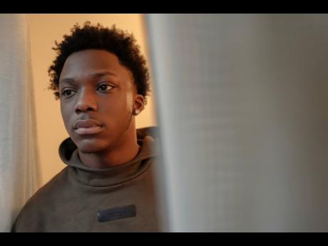 Camden Lee, 16, poses for a portrait at his family's apartment, Tuesday, January 28, 2025, in the Brooklyn borough of New York. (AP Photo/Julia Demaree Nikhinson)