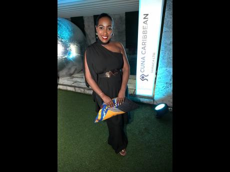 Katrina D’Aguilar, JCCUL group marketing and communications manager, knows that a statement clutch is the go-to accessory to add a bit of jazz to an all-black outfit.