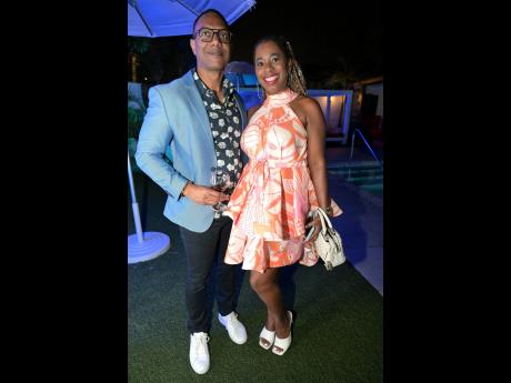 For Notoya Tenn, collections officer of Portland Co-operative Credit Union, nothing beats a Shem’s Designs dress for a night of dancing. Here, she poses with Andre Goindoo, managing director and CEO of CUNA Caribbean Insurance.
