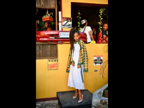 Donisha Pendergast wears the Xaymaca printed shirt jacket.