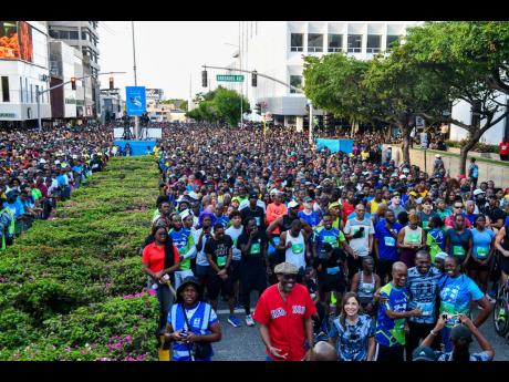 Credit: Matthew McKoy/Photographer A view of the more than 30,000 participants, a record, who participated in the Sagicor Sigma Run 2025 held in New Kingston yesterday. See related story on Page A6.