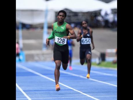 Calabar High’s Junior Gallimore winning his Class One 400 metres heat in 48.25 seconds at the S. W.  Isaac-Henry Invitational meet at the National Stadium last Saturday. The overall winner was Jordan Fitzgerald of Papine High, who took his heat in 48.04.