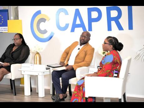 Credit: Rudolph Brown/Photographer Claudette Thompson, senior director of public prosecutions; with Senior Superintendent of Police Dennis Brooks and Dr Dalea Bean, head of the Institute for Gender and Development Studies at The University of the West Indies, Mona campus, during the launch