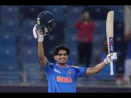 India’s Shubman Gill celebrates after scoring a century during the ICC Champions Trophy cricket match between India and Bangladesh at the Dubai International Cricket Stadium  yesterday.