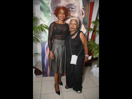 Kellie Magnus (left), executive director of the Caribbean Culture Fund, draws close to her mother, Valerie Magnus, creative director, Edge Marketing Solutions Caribbean Ltd.