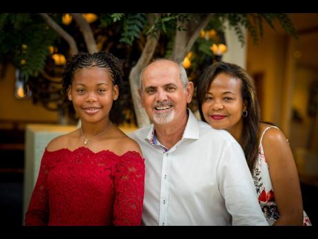 Pierre Battaglia and second wife Delouise, a villa manager, along with his stepdaughter, Danielle, who is currently pursuing hospitality studies at the University of Technology in St Andrew.