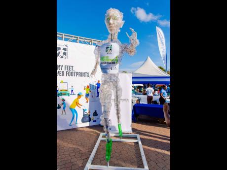 Sculptor Scheed Cole’s  ‘The Eco-Champion’ at the Sagicor Sigma Run.
