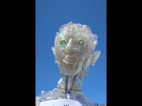 Sculptor Scheed Cole’s  ‘The Eco-Champion’ at the Sagicor Sigma Run.