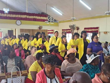 Members of the Pentecostal Assemblies of Jesus Praise Temple’s choir lead a procession to the church’s platform during during the launch of the RJRGLEANER Communication Group’s 21st annual Region One Cross Country Invasion series of activities, held 