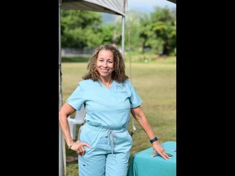 Dr Bernadette Bryan-Frankson, a canine rehabilitation therapist and owner of Paws for Physio. 