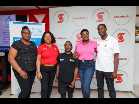 Credit: Contributed After an inspiring financial literacy workshop, SOS Children’s Villages Jamaica and Scotiabank representatives come together to celebrate knowledge, growth, and brighter financial futures. From left: Margilee Williams, house mother at SOS Children’s Vi