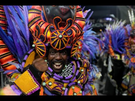 A performer from the Salgueiro samba school parades during Carnival celebrations at the Sambadrome in Rio de Janeiro, Brazil, in February 2024.