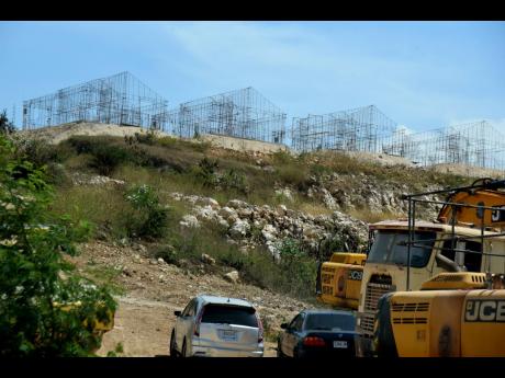 
The frames of some of the homes in the Hellshire View gated community in Portmore, St Catherine.