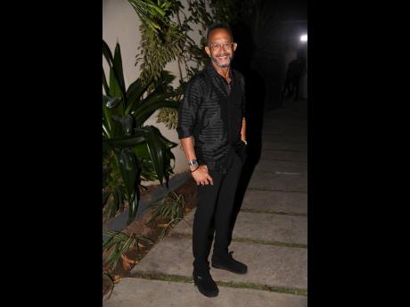 TV Host 
Neville Bell 
is sharp 
in all-black.