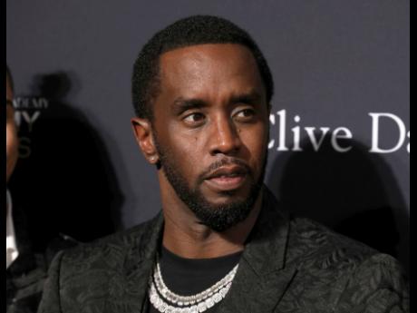 Sean Combs arrives at the Pre-Grammy Gala And Salute To Industry Icons at the Beverly Hilton Hotel on Saturday, January 25, 2020, in Beverly Hills, California. (Photo by Mark Von Holden/Invision/AP, File)