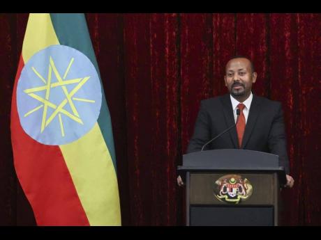 Credit: (Hasnoor Hussain/Pool Photo via AP, File) Ethiopian Prime Minister Abiy Ahmed speaks during an exchange of notes after his meeting with Malaysia’s Prime Minister Anwar Ibrahim in Putrajaya, Malaysia, October 26, 2024. (Hasnoor Hussain/Pool Photo via AP, File)