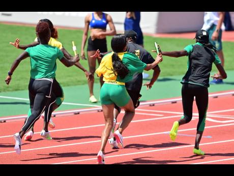 Jamaica’s Mixed Relay team practises baton exchange at a training session with the national athletics team at the Edogawa City Athletic Stadium in Tokyo, Japan, in 2021. 