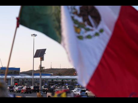 Credit: AP Vehicles wait in line to cross the border into the United States at the San Ysidro Port of Entry, Tuesday, March 18, 2025, in Tijuana, Mexico.