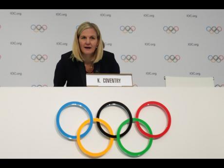 Kirsty Coventry arrives for a press conference after she was elected as the new IOC president at the International Olympic Committee 144th session in Costa Navarino, western Greece.