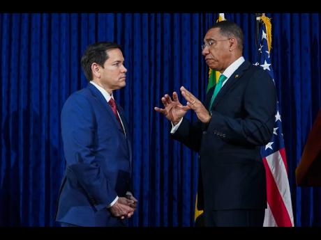 US Secretary of State Marco Rubio (left) and Jamaica's Prime Minister Andrew Holness speak at the end of a joint news conference at the Office of the Prime Minister in Kingston.