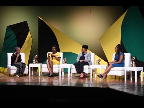 Sharon Smith (second from left), head of business banking at JN Bank, makes a point during the panel discussion ‘Fund Her’ at the Women in Theatre Festival held at the Little Theatre in St Andrew on March 24. Listening in are (from left) the discussion