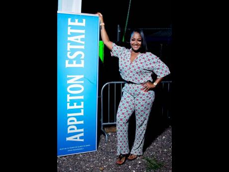 Janneal Fagan, a longtime fan of Sizzla Kalonji, anxiously awaits the artiste’s arrival on stage.