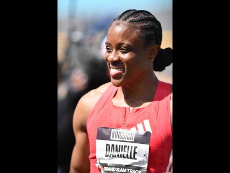 Sprint hurdler Danielle Williams smiling after winning the women’s 100m at the Grand Slam Track meet at the National Stadium in St Andrew on April 6.