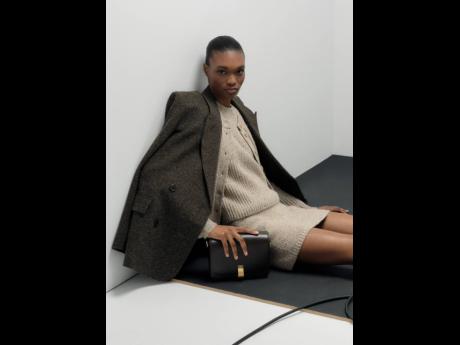 This ensemble from the new collection sees Depass suited in a tweed blazer, Nep knit cardigan, Nep knit shell, Nep knit miniskirt, complemented by the Etta large day bag.
