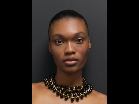 Depass in the Amelie necklace from Oroton's new Autumn/Winter 2025 collection.