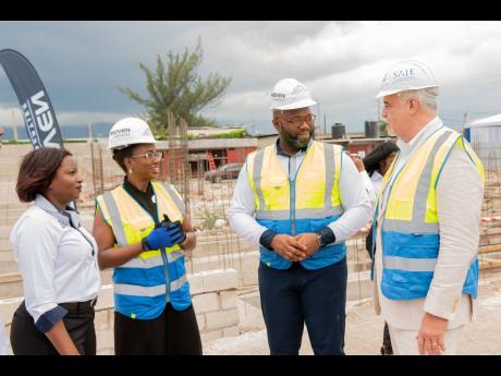 The US$13 million project is a joint venture between SAJE Logistics Infrastructure Limited and Proven Properties Limited, with financing by First Global Bank. The partners’ representatives (from left): Terry-Ann Graver, CEO of First Global Bank; Aisha Ca