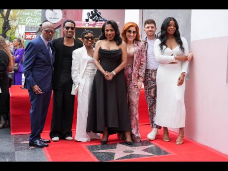 Sheryl Lee Ralph (centre) is supported by her 'Abbott Elementary' cast (from left) William Stanford Davis, Tyler James WIlliams, Quinta Brunson, Lisa Ann Walter, Chris Perfetti, and Janelle James.