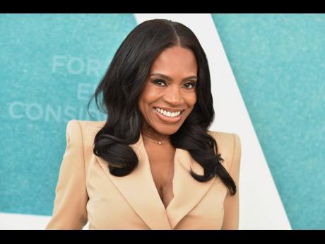 Sheryl Lee Ralph shows off her effortless glam and loose waves. 