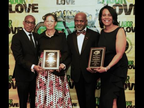 Credit: Ajamu From left: Blane Stoddart (TJB Philadelphia), honouree Karlene Largie; Irwine G. Clare, Snr OD (TJB). and honoree Sandra Brunson of Second Round Foundation.