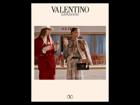 SAINT International stunner Sanique Dill (right) with model Hank Akerlund in the just-released Valentino Fall/Winter 2025 campaign, lensed by Glen Luchford.
