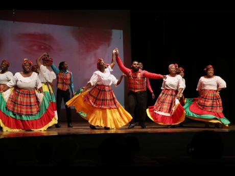 The Nexus Performing Arts Company performs ‘Dis Lang Time Gal’ during the Cultural Tribute and Memorial Service for Munair Zacca.