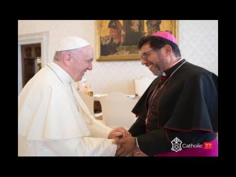 Pope Francis (left) and Archbishop of Port-of-Spain Charles Gordon.