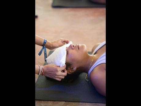 Felicia Wong, content creator, guided by Sara Silvera in the Mindful Movement session.