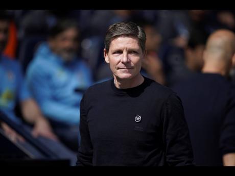 Crystal Palace’s head coach Oliver Glasner enters to the pitch prior to the English Premier League football match against Manchester City at the Etihad Stadium in Manchester, England, on Saturday, April 12.