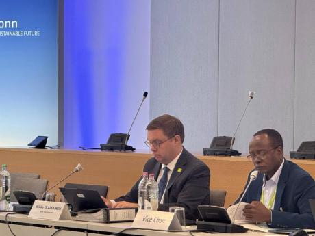 Mikko Ollikainen (left), head of the Adaptation Fund, is seen here during the recent board meeting of the AF with the board’s new vice-chair, Washington Zhakata of Zimbabwe.