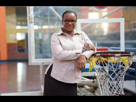 Credit: Contributed Lavana Shorter stands confidently by the basketball hoop inside the G.C. Foster College of Physical Education and Sport gymnasium.