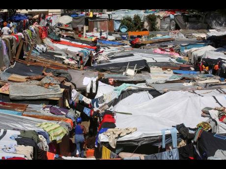 Makeshift tents fill a camp set up by people displaced from their homes by gang violence in Port-au-Prince, Haiti, Monday, April 14, 2025. 