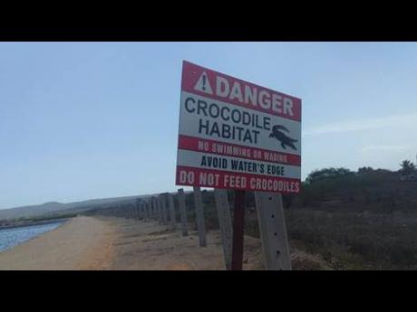 A National Water Commission safety sign at the Greater Portmore Wastewater Treatment Pond in Portmore, St Catherine